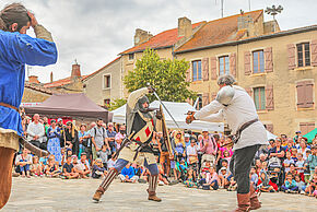 Photo d'un duel à l'épée